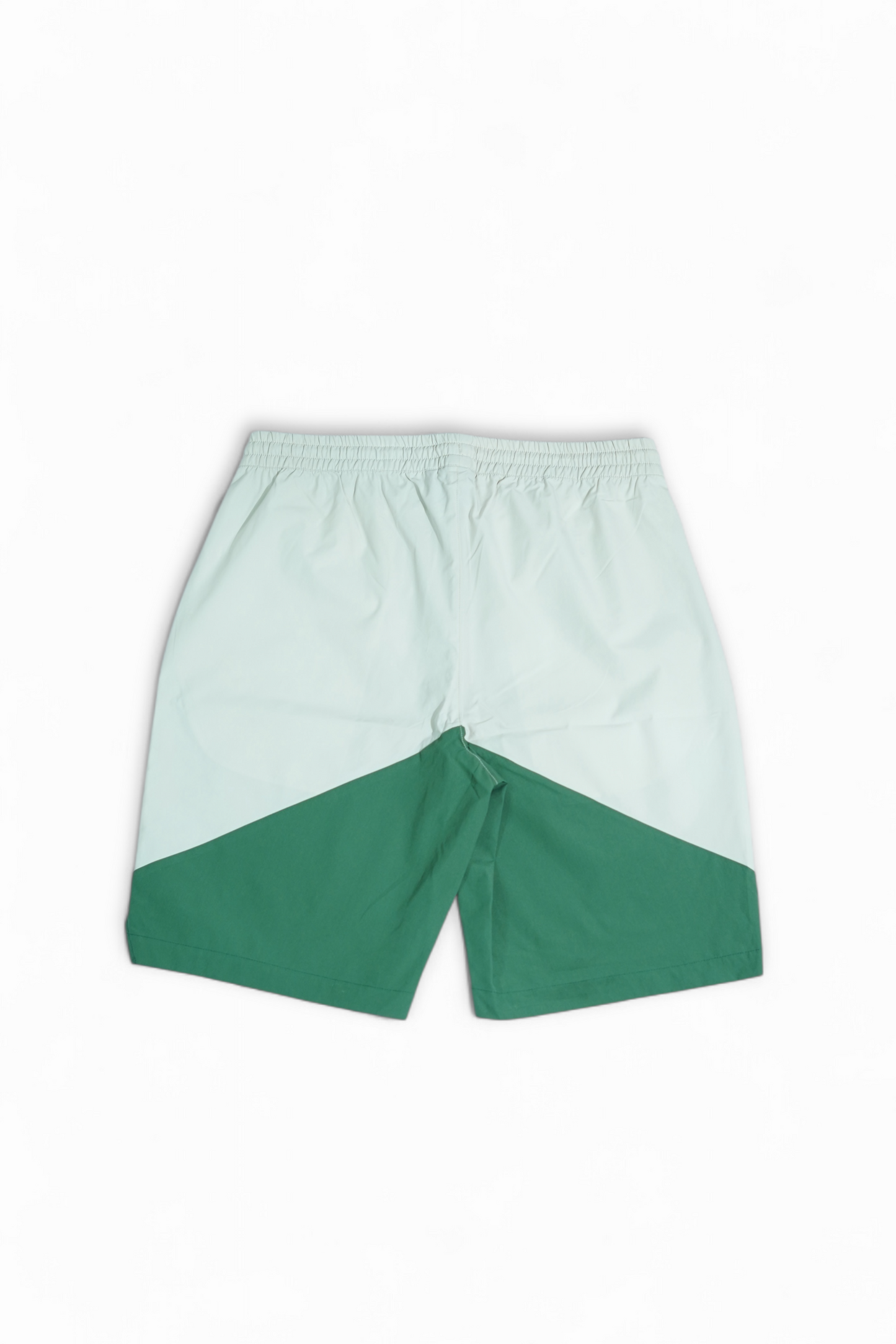 COMEUNITY Cut Sew Shorts White & Green Backside Image on a white background